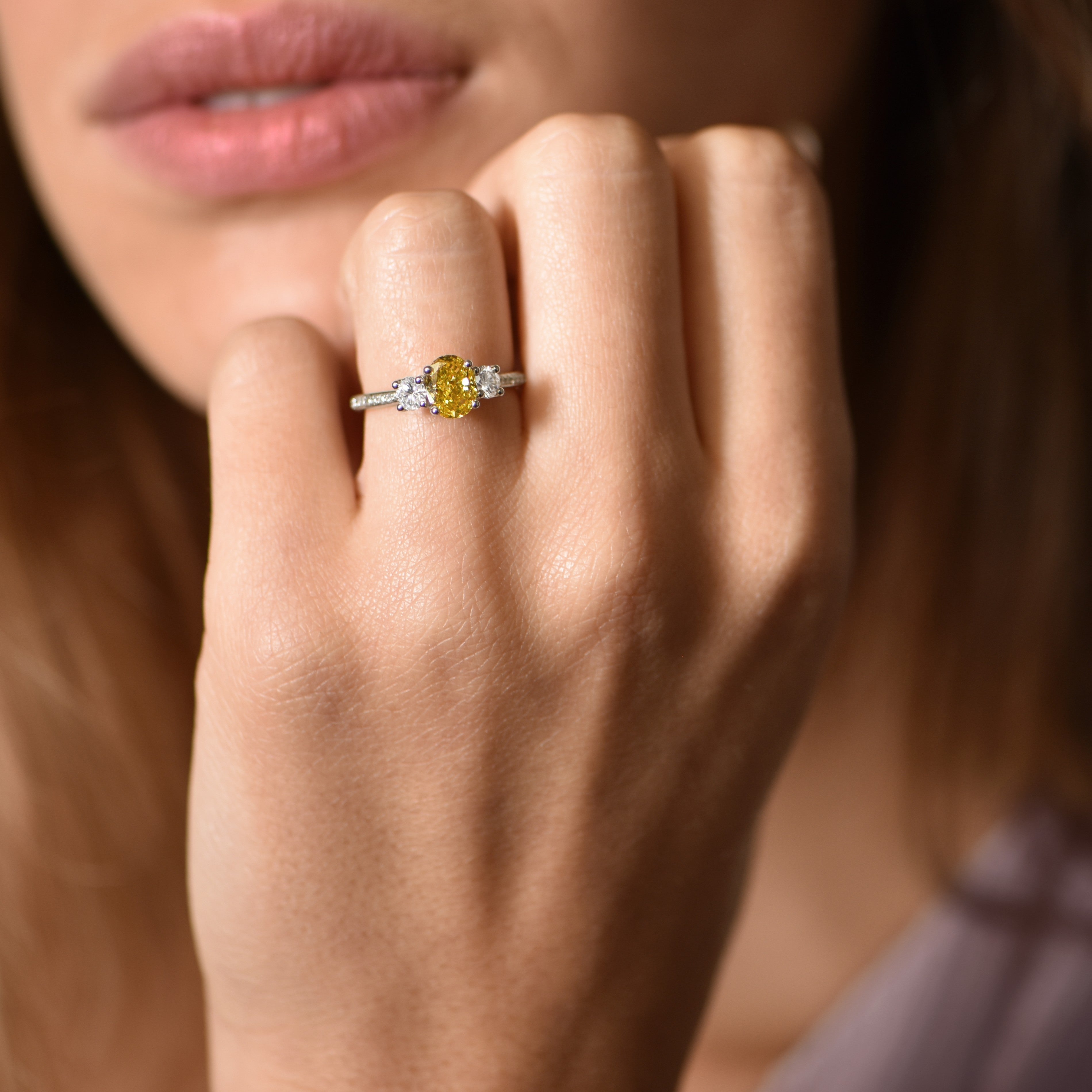 Trilogy ring with yellow diamond