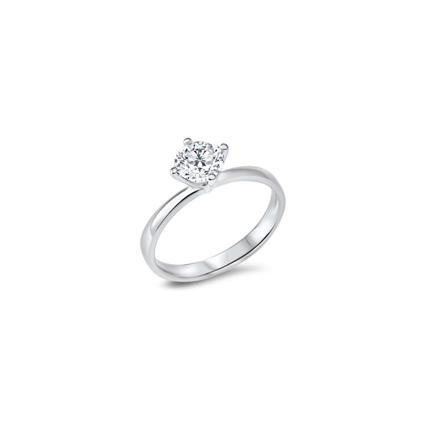 diamant taille brillant de 1 carat est monté sur un anneau dont le corps se rétrécit au niveau de la pierre centrale.