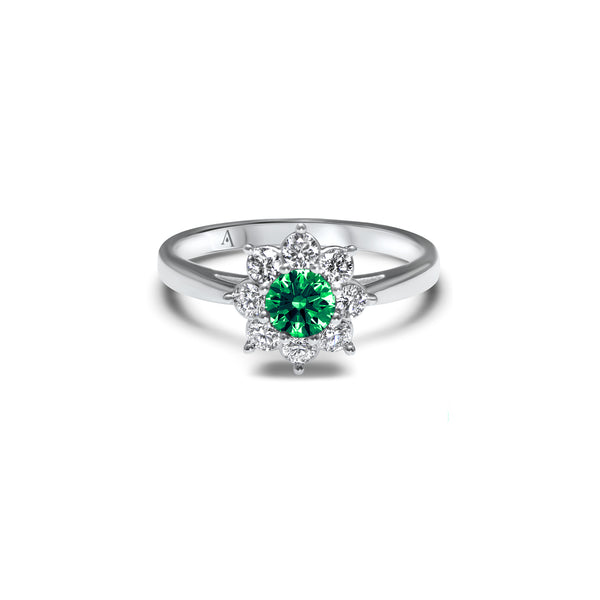 Solitaire avec un Emerald de culture couronné par huit pétales de diamants de culture qui apportent une touche fleurie à cette bague de fiançailles.
