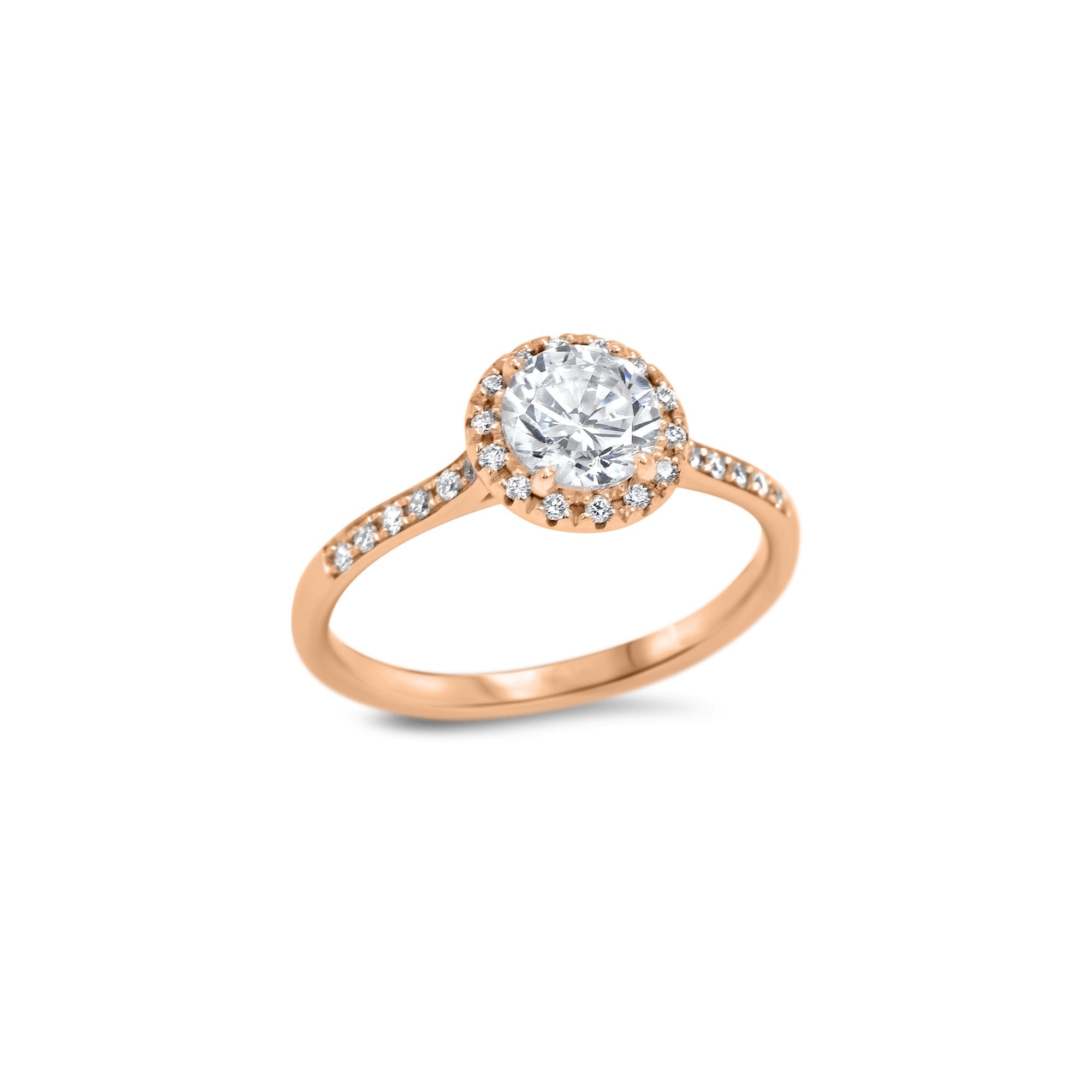Solitaire avec un diamant de culture de 0.75ct entouré d'un magnifique halo de diamants et un sertissage en micropavé sur le pourtour de la bague.